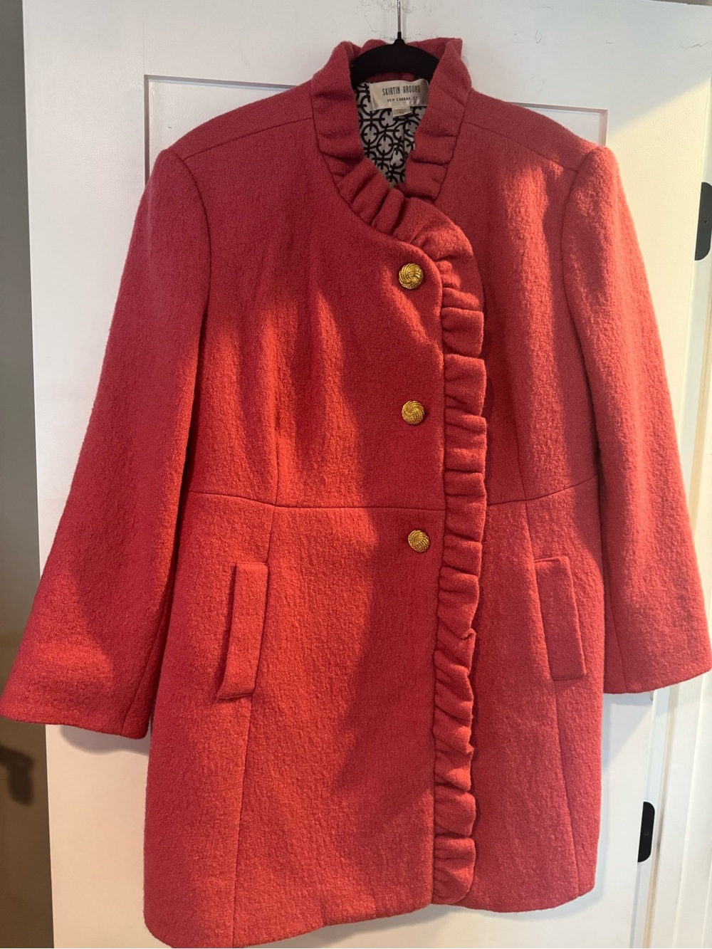 Skirtin Around Coral Pea Coat with Ruffle Trim